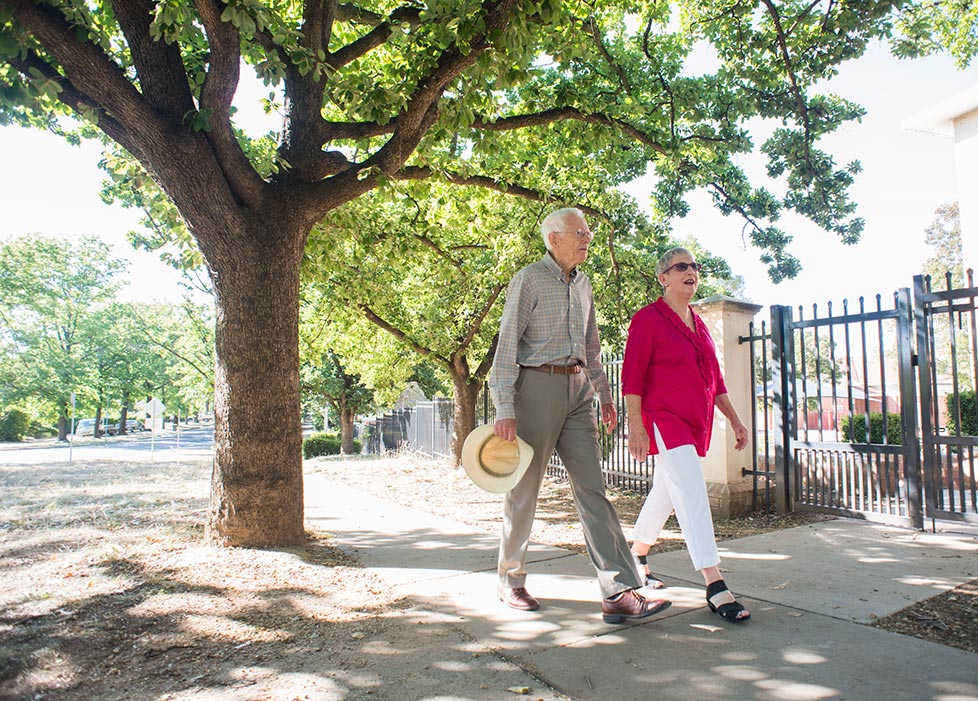 Elderly couple walking