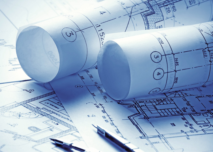 Rolled up plans of a house